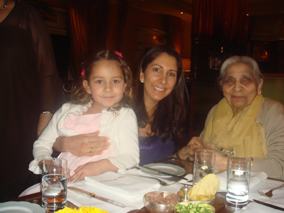 Three generations at the dinner table — Natasha with her daughter and her grandmother, Indian Nanny